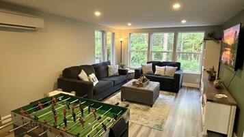 Smart TV, fireplace, DVD player, foosball