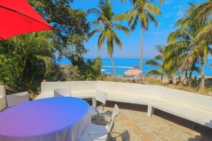 Outdoor dining - Beachfront Bungalow Overlooking Playa Quimixto (Puerto Vallarta)