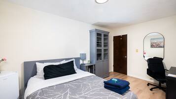1 bedroom, desk, iron/ironing board, travel cot