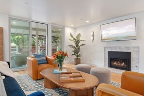 Smart TV, fireplace, books