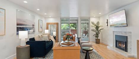 Smart TV, fireplace, books