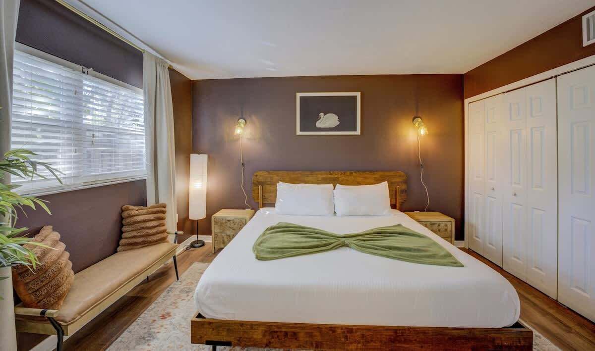 1 bedroom, desk, iron/ironing board, travel crib