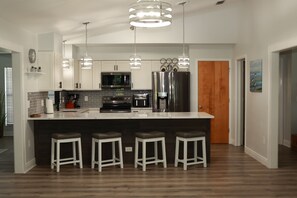 Fridge, microwave, oven, stovetop - Spacious home near W. Dearborn St. Heated pool. Minutes away from 2 beaches! (Englewood)