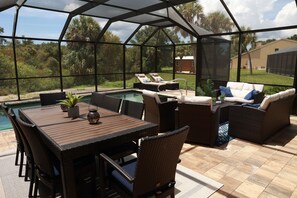 Outdoor dining - Spacious home near W. Dearborn St. Heated pool. Minutes away from 2 beaches! (Englewood)