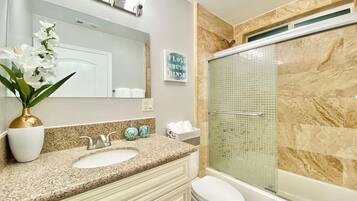 Hair dryer, towels, soap, shampoo