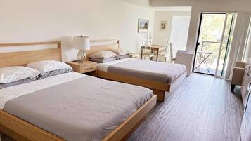 Desk, laptop workspace, free WiFi, bed sheets