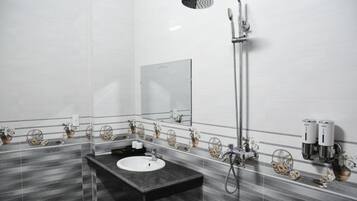 Shower, hair dryer, slippers, towels