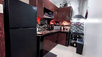 Fridge, microwave, stovetop, electric kettle