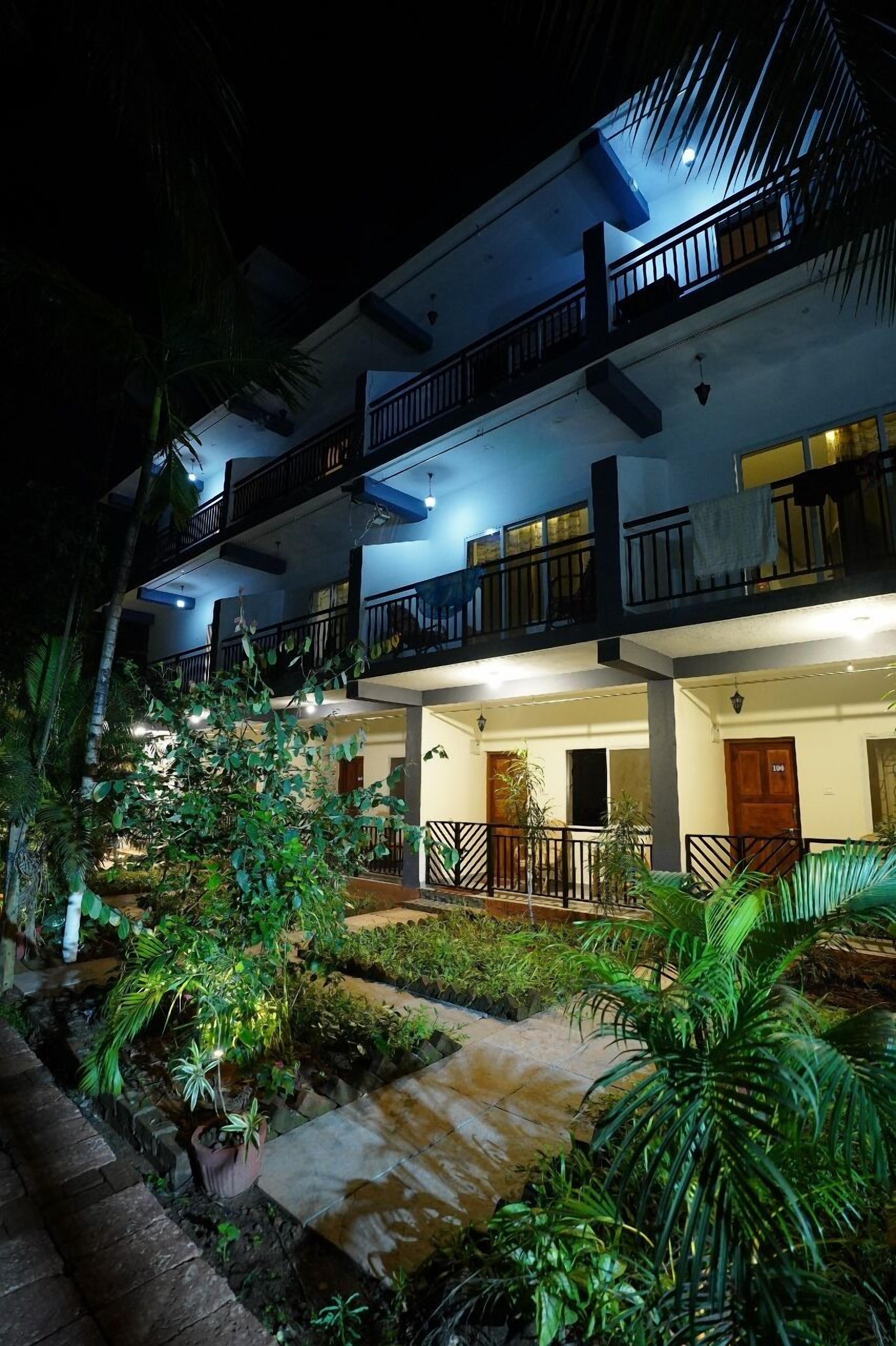 Chambre Double Deluxe | Salle de séjour | Télévision