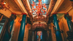 An ornate hallway with a glass ceiling and a chandelier. - House of Tugu Old Town Jakarta (Jakarta)