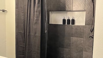 Hair dryer, towels, soap, shampoo