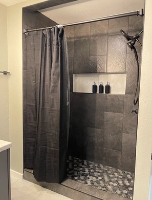 Hair dryer, towels, soap, shampoo