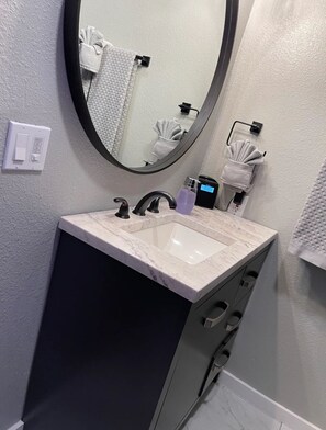 Hair dryer, towels, soap, shampoo