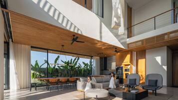 65-inch flat-screen TV with cable channels