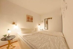2 dormitorios, tabla de planchar con plancha, wifi