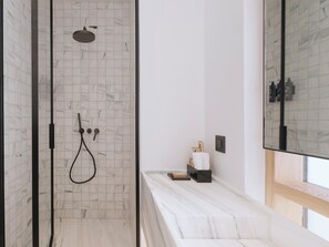 Deluxe Suite, 1 King Bed | Bathroom | Shower, rainfall showerhead, slippers, towels - Athens Capital Suites-Mgallery Collection (Athens)