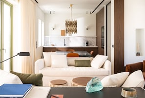 Presidential Suite, Multiple Beds | Living area | 55-inch TV with cable channels