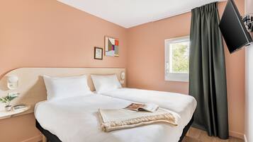 Literie de qualité supérieure, surmatelas, chambres insonorisées