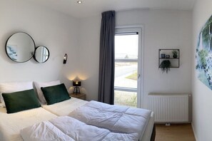 2 室のベッドルーム、WiFi (無料)、ベッドシーツ