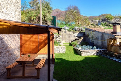 Historic house in the artistic village of Brè (THE SECRET GARDEN)