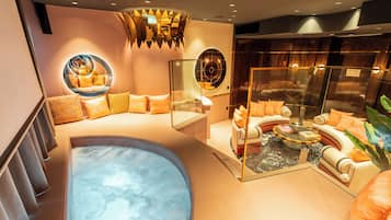 Mama 2-Bedroom Suite | Living area | 25-inch Smart TV with satellite channels, table football, pay films