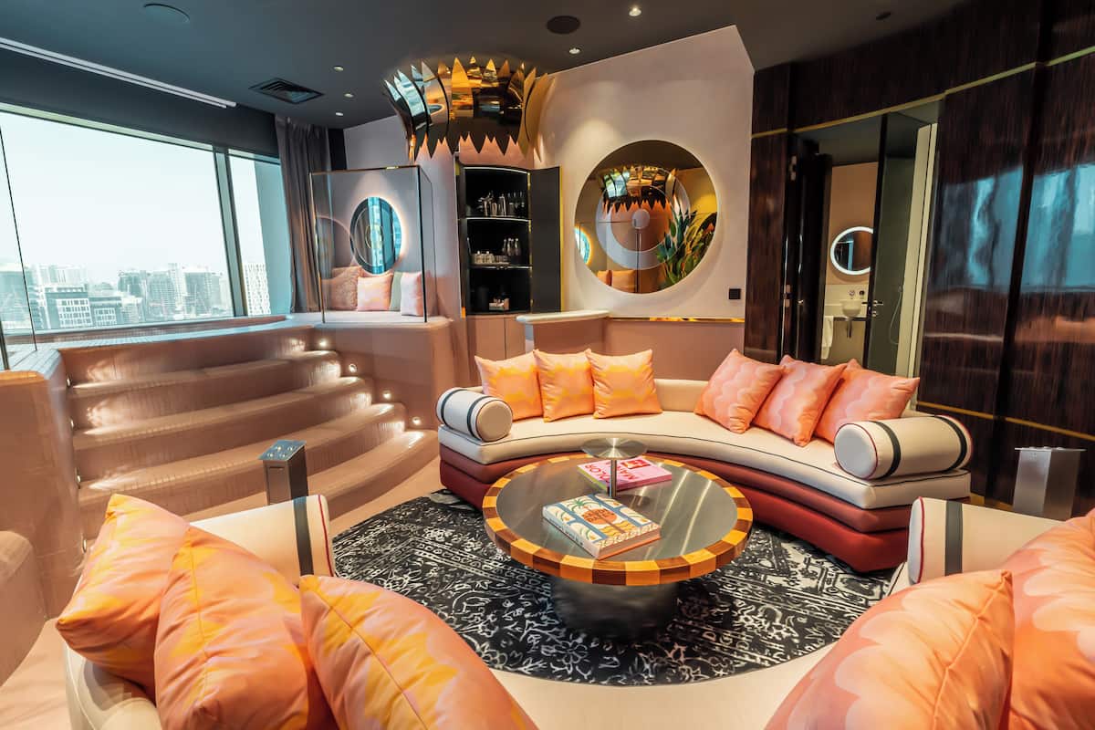 Mama 2-Bedroom Suite | Living area | 25-inch Smart TV with satellite channels, foosball, pay movies