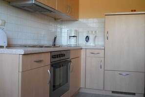 Kjøleskap, ovn og kokeplater