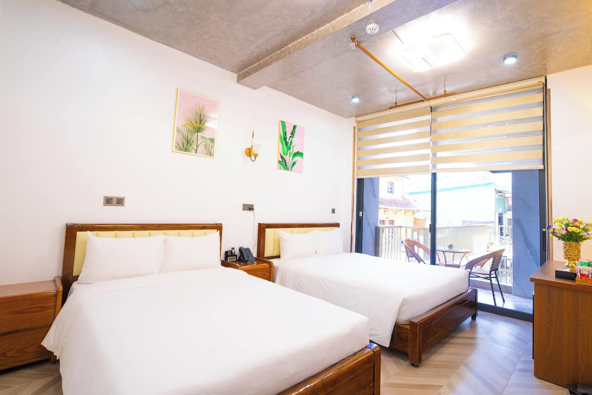 Familiekamer | 2 slaapkamers, luxe beddengoed, een minibar met enkele gratis items