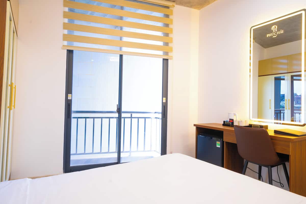 2 slaapkamers, luxe beddengoed, een minibar met enkele gratis items