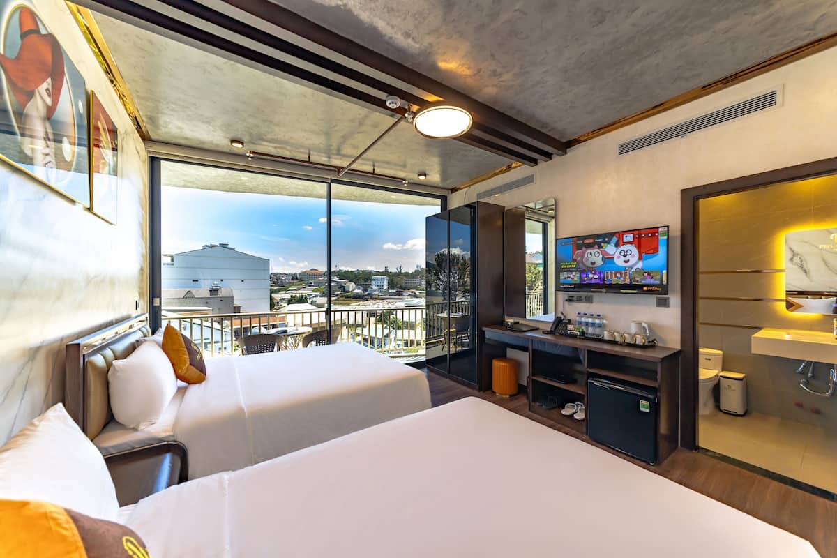 2 slaapkamers, luxe beddengoed, een minibar met enkele gratis items