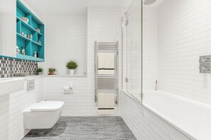 Hair dryer, towels, soap, shampoo