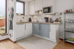 Micro-ondas, cooktop, cafeteira/chaleira