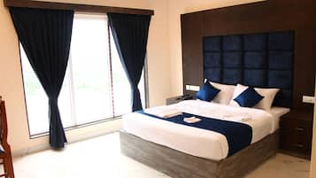 Habitación Deluxe con 1 cama matrimonial o 2 individuales, para no fumadores | Espacio para trabajar con laptop y wifi gratis