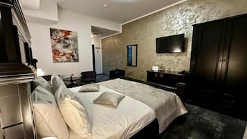 Deluxe Double Room | Minibar, desk, laptop workspace, blackout curtains