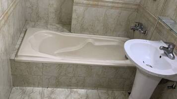 Hair dryer, bidet, towels, soap