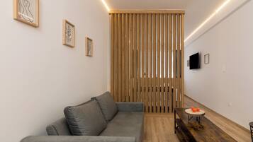 Apartamento | Área de estar | TV de tela plana