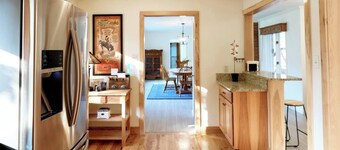 Spacious Sunny Home with a Big Fenced Yard near Downtown, near walking paths, bridge over creek, park, pool, playground and YMCA all within walking distance.