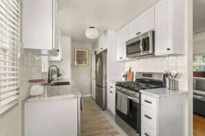 Fridge, microwave, oven, stovetop - PB Bungalow-Private fenced yard-Parking-Remodeled! (San Diego)
