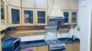 Deluxe House, 3 Bedrooms | Private kitchen | Fridge, microwave, oven, blender - One Season Hostel (Cairo)