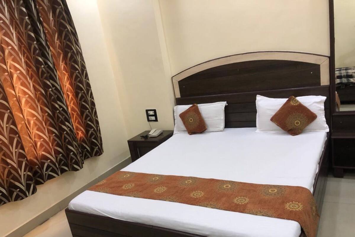 Habitación doble Deluxe, vista a la ciudad | Wifi gratis y ropa de cama