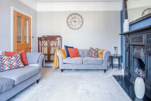 32-inch flat-screen TV with cable channels