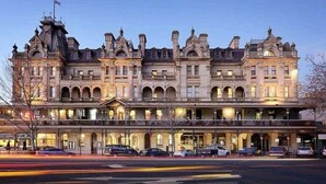 A historic building with multiple stories, large windows, and a prominent entrance. - Luxurious terrace home in heart of Bendigo (Bendigo)