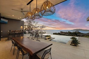 Outdoor dining - Infinity Ocean Views & Mountain in Every Corner (Playa Tamarindo)