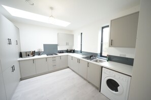 Full-size fridge, microwave, oven, toaster