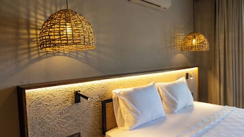 Chambre Deluxe, vue jardin | Draps en coton égyptien, literie de qualité supérieure, minibar