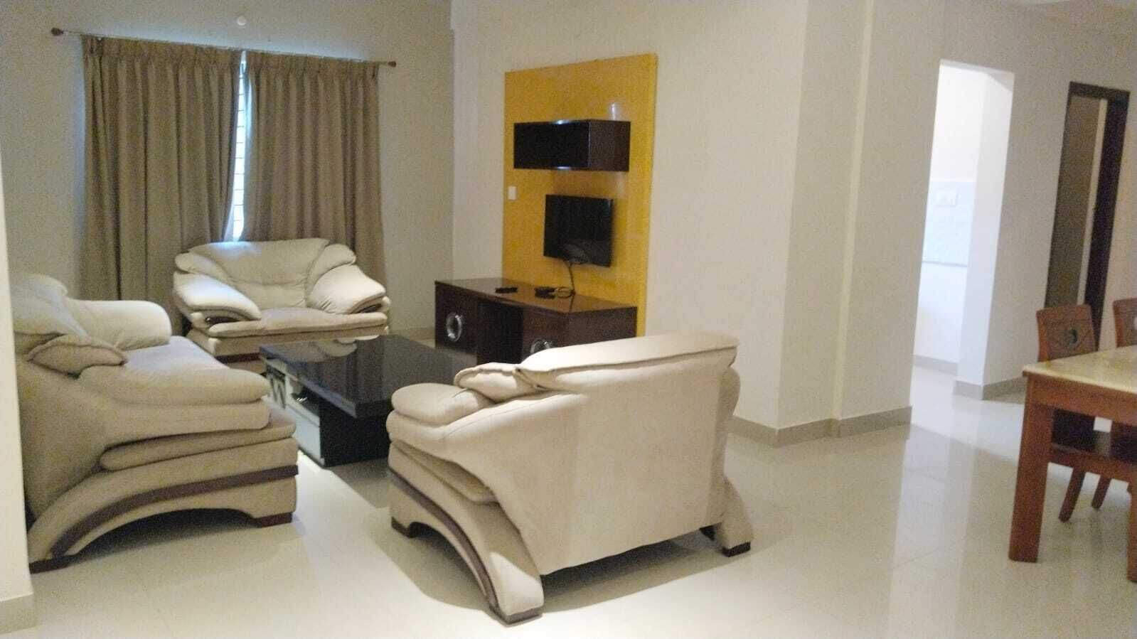 Family Room, 3 Bedrooms, City View | Living area | 32-inch LED TV with premium channels