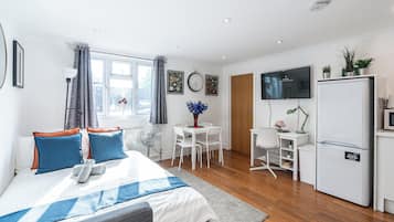 1 bedroom, desk, iron/ironing board, travel cot