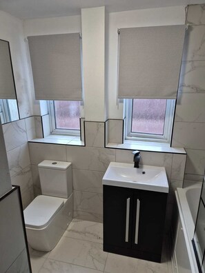 Hair dryer, towels, soap, shampoo