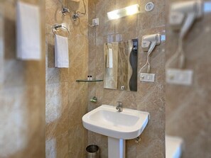 Shower, towels, soap, shampoo