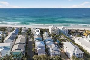 A coastal residential area with houses, a beach, and a marker indicating a specific location. - Gulf Side Gated Comm with Beach Access- Fintastic by Royal Destinations (Santa Rosa Beach)